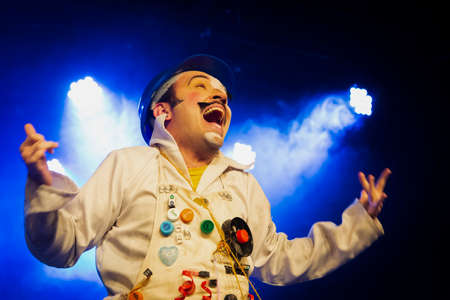 Actor representing a character on the stage of a theater. He makes various gestures and expressions...
