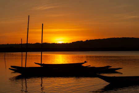 Cachoeira, Bahia, Brazil - November 29, 2014: Silhouette at sunset of canoes docked in the grandiose Paraguacu river, located in the Brazilian state of Bahia.のeditorial素材