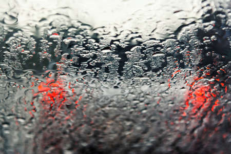 Daily traffic ,view through the window on rainy day. Salvador, Bahia, Brazilの写真素材