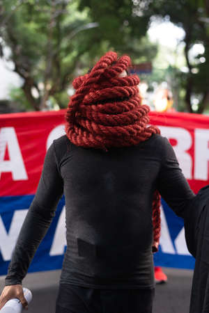 Salvador, Bahia, Brazil - June 19, 2021: Protesters protest against the government of President Jair...