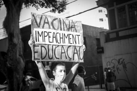 Salvador, Bahia, Brazil - June 19, 2021: Protesters protest against the government of President Jair Bolsonaro in the city of Salvador.のeditorial素材