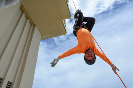 A man rappelling down the Lacerda Elevator. City of Salvador, Bahia, Brazil.の写真素材