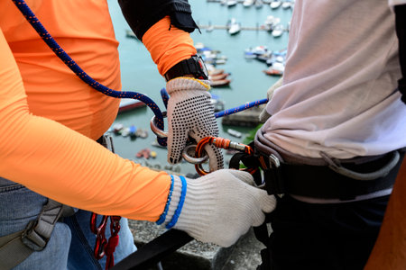 Rappellists preparing to descend a very tall building. Salvador Bahia Brazil.の写真素材
