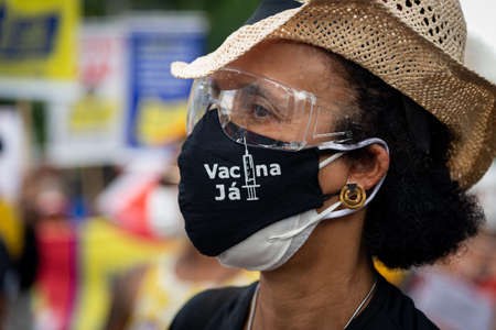 Salvador, Bahia, Brazil - June 19, 2021: Protesters protest against the government of President Jair Bolsonaro in the city of Salvador.のeditorial素材