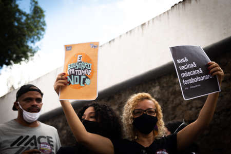 Salvador, Bahia, Brazil - June 19, 2021: Protesters protest against the government of President Jair Bolsonaro in the city of Salvador.のeditorial素材