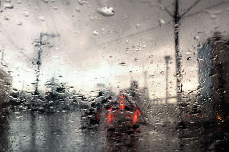 Daily traffic ,view through the window on rainy day. Salvador, Bahia, Brazilの写真素材