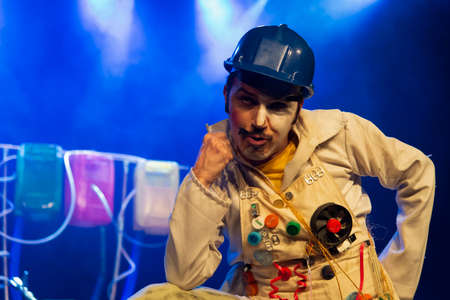 Actor representing a character on the stage of a theater. He makes various gestures and expressions...