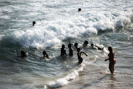Salvador, Bahia, Brazil - September 05, 2021: People bathing in the water at Paciencia beach in Salvador, Bahia, Brazil.のeditorial素材