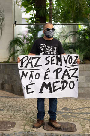 Salvador, Bahia, Brazil - June 19, 2021: Protesters protest against the government of President Jair Bolsonaro in the city of Salvador.のeditorial素材