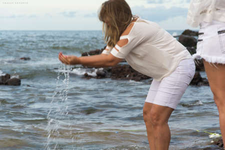 Salvador, Bahia, Brazil - February 02, 2016: Member of the candomble religions participates in a party in honor of Yemanja in the city of Salvador.のeditorial素材