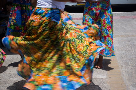 Salvador, Bahia, Brazil - December 06, 2015: Women dancing the traditional samba de roda of Bahia with colorful clothes. Salvador, Bahia, Brazil.のeditorial素材