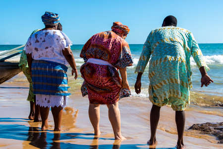 Salvador, Bahia, Brazil - January 20, 2019: Traditional party in honor of Iemanja, the queen of the sea, where gifts are taken to the sea by members of the religion.のeditorial素材