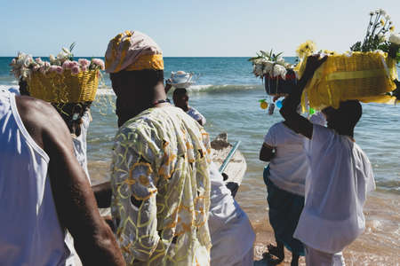 Salvador, Bahia, Brazil - January 20, 2019: Traditional party in honor of Iemanja, the queen of the sea, where gifts are taken to the sea by members of the religion.のeditorial素材