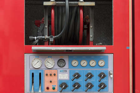 Santo Amaro, Bahia, Brazil - January 31, 2016: Detail of part of a fire truck and electricity in...