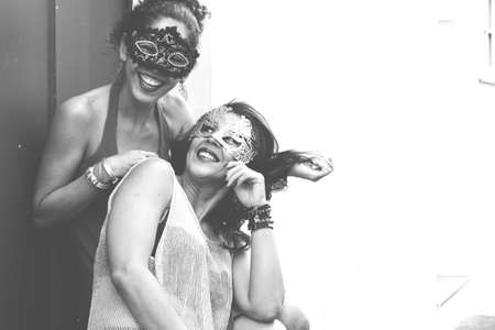 Portrait of two women wearing mask. Salvador, Bahia, Brazil.