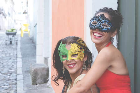 Portrait of two women wearing  mask. Salvador, Bahia, Brazil.の写真素材