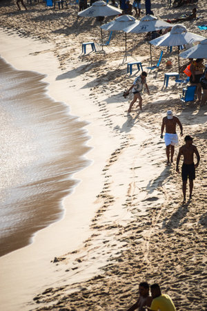 Salvador, Bahia, Brazil - September 05, 2021: People having fun on the sands of Paciencia beach in Salvador, Bahia, Brazil.のeditorial素材
