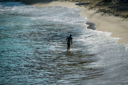 Salvador, Bahia, Brazil - September 05, 2021: People bathing in the water at Paciencia beach in Salvador, Bahia, Brazil.のeditorial素材