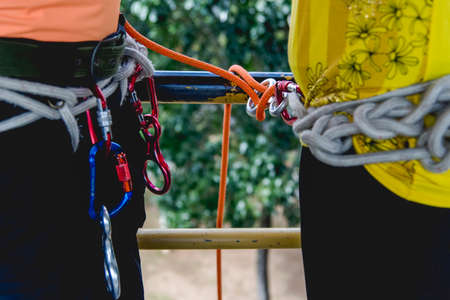 Salvador, Bahia, Brazil - September 17, 2017: Rappel practitioners preparing the equipment to perform the activity next. Salvador Bahia Brazil.のeditorial素材
