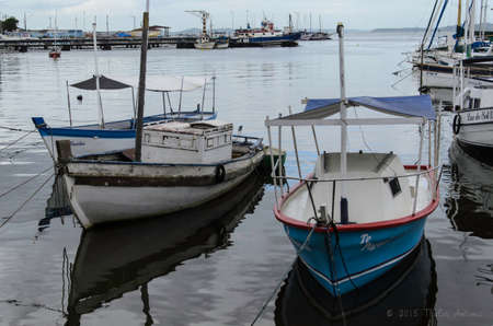 Salvador, Bahia, Brazil - January 09, 2015: Fishing and tour boats docked at Ribeira marina in Salvador city, Bahia, Brazil.のeditorial素材