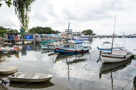 Salvador, Bahia, Brazil - January 09, 2015: Fishing and tour boats docked at Ribeira marina in Salvador city, Bahia, Brazil.のeditorial素材