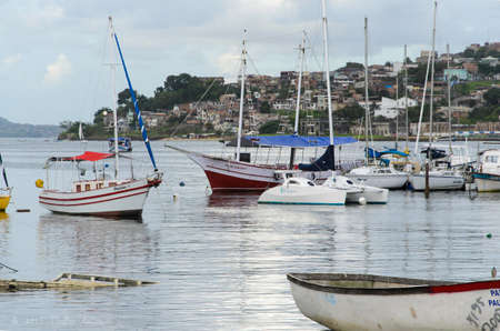Salvador, Bahia, Brazil - January 09, 2015: Fishing and tour boats docked at Ribeira marina in Salvador city, Bahia, Brazil.のeditorial素材