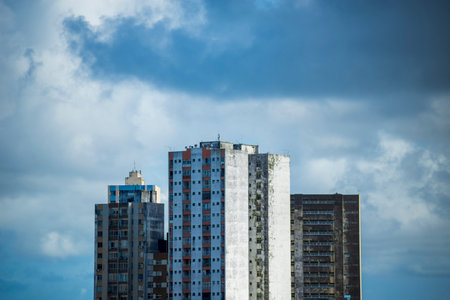 View of tall buildings against blue sky with clouds. Salvador, Bahia, Brazil.