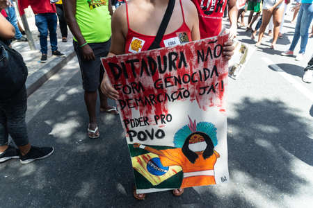 Salvador, Bahia, Brazil - September 07, 2021: Brazilians protest with banners and posters against the government of President Jair Bolsonaro in the city of Salvador, in the state of Bahia.のeditorial素材