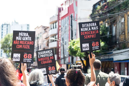 Salvador, Bahia, Brazil - September 07, 2021: Brazilians protest with banners and posters against...
