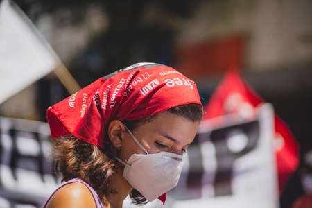 Salvador, Bahia, Brazil - September 07, 2021: Brazilians protest with banners and posters against...