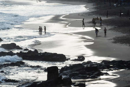 Salvador, Bahia, Brazil - September 26, 2021: Groups of people at Farol da Barra beach in Salvador city, Bahia state, Brazil.のeditorial素材