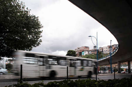 Bus captured in low speed movement on the street. City of Salvador, Bahia, Brazil.のeditorial素材