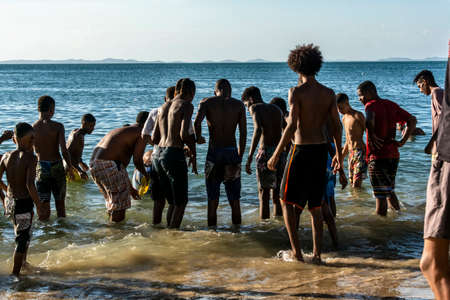 Salvador, Bahia, Brazil - March 09, 2019: People at Ribeira beach in Salvador Bahia, having fun in the water.のeditorial素材