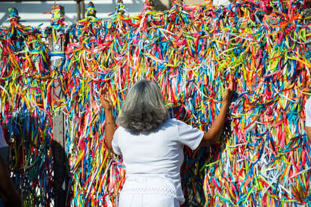 Salvador, Bahia, Brazil - January 07, 2022: Faithful gathered at the famous Senhor do Bonfim church...