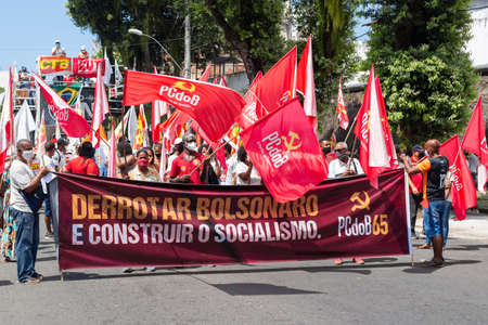 Salvador, Bahia, Brazil - October 02, 2021: Brazilians protest with banners and posters against the government of President Jair Bolsonaro in the city of Salvador.のeditorial素材