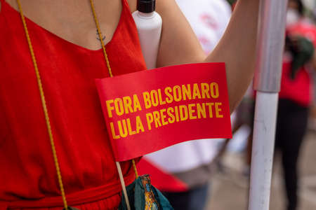 Salvador, Bahia, Brazil - October 02, 2021: Brazilians protest with banners and posters against the...