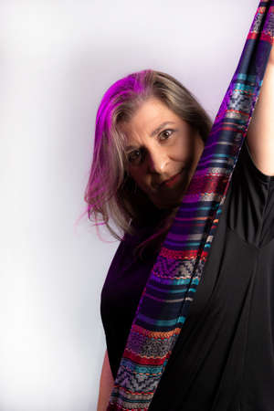 Portrait of a woman with hijab against a black background. Salvador Bahia Brazil.の写真素材