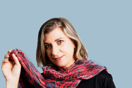 Portrait of a woman with hijab against a black background. Salvador Bahia Brazil.の写真素材