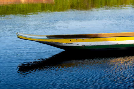 Canoes and boats docked on the Jaguaripe River in Maragogipinho, Aratuipe city in Bahia, Brazil.の写真素材