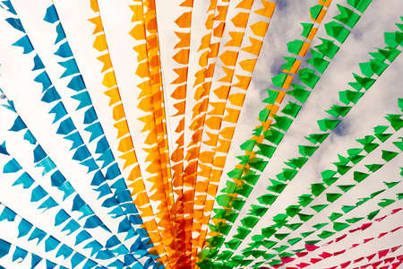 Colorful flags decorating the feast of Sao Joao in Pelourinho, Historic Center of Salvador, Bahia.の写真素材