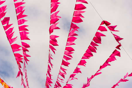 Colorful flags decorating the feast of Sao Joao in Pelourinho, Historic Center of Salvador, Bahia.の写真素材