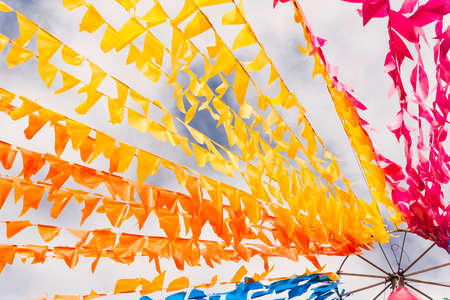 Colorful flags decorating the feast of Sao Joao in Pelourinho, Historic Center of Salvador, Bahia.の写真素材