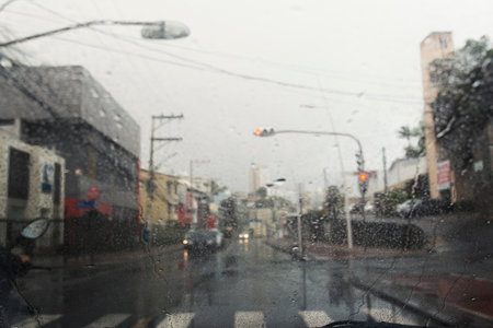 Daily traffic ,view through the window on rainy day. Salvador, Bahia, Brazilのeditorial素材