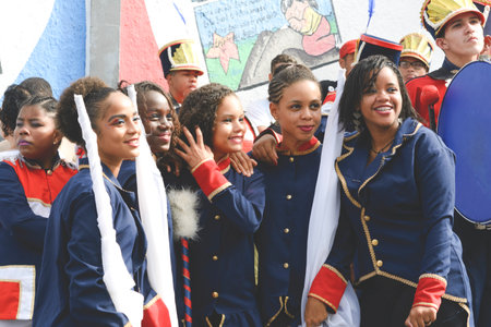 Salvador, Bahia, Brazil - July 02, 2017: Public school students participate in the Dois de Julho cultural parade in Lapinha neighborhood in Salvador, Bahia.のeditorial素材