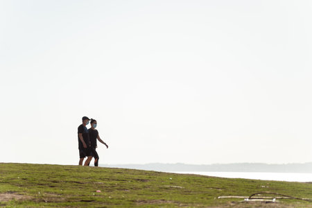 Salvador, Bahia, Brazil - May 21, 2021: People having fun on a grass floor in Barra neighborhood in Salvador, Bahia.のeditorial素材