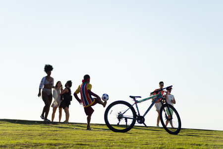 Salvador, Bahia, Brazil - May 21, 2021: People having fun on a grass floor in Barra neighborhood in Salvador, Bahia.のeditorial素材