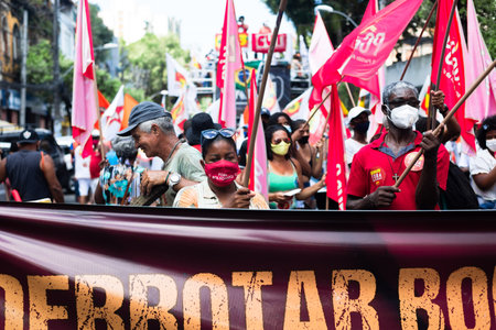 Salvador, Bahia, Brazil - October 02, 2021: People protesting with banners, posters and screams at the event against the government of President Bolsonaro, in Salvador, Bahia.のeditorial素材