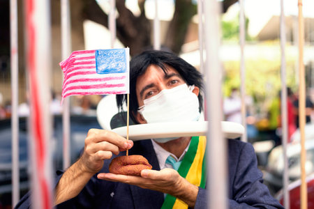 Salvador, Bahia, Brazil - October 02, 2021: People protesting with banners, posters and screams at the event against the government of President Bolsonaro, in Salvador, Bahia.のeditorial素材