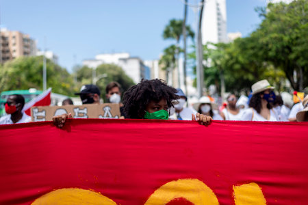 Salvador, Bahia, Brazil - October 02, 2021: People protesting with banners, posters and screams at the event against the government of President Bolsonaro, in Salvador, Bahia.のeditorial素材