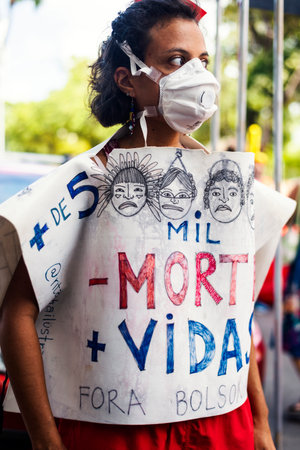 Salvador, Bahia, Brazil - October 02, 2021: People protesting with banners, posters and screams at the event against the government of President Bolsonaro, in Salvador, Bahia.のeditorial素材
